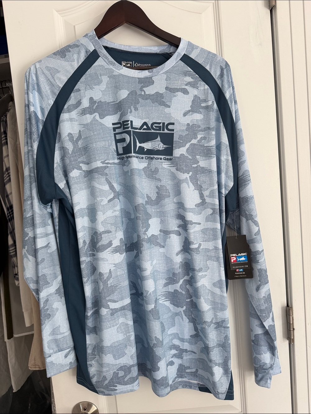 Pelagic performance fishing top